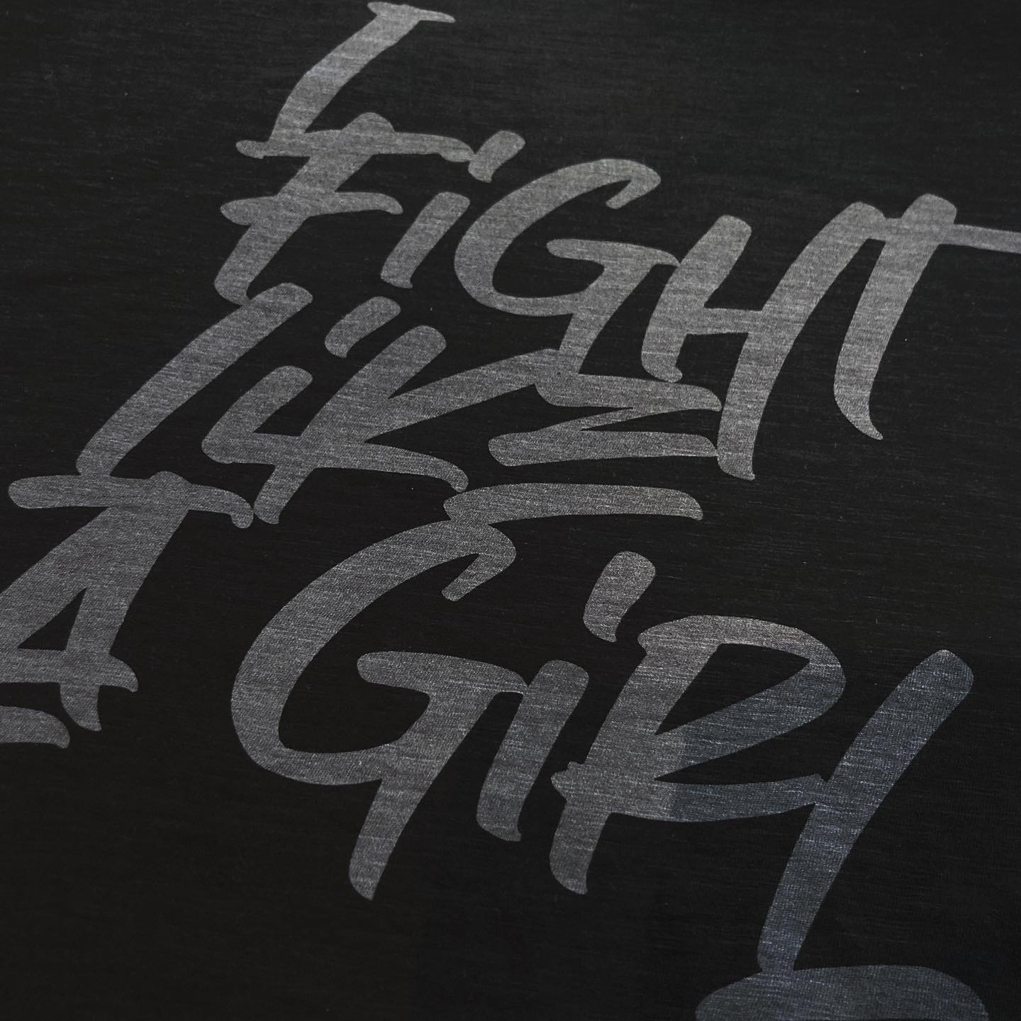 WOMEN SHIRT WITH I FIGHT LIKE A GIRL PRINT